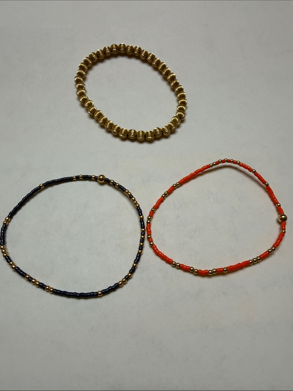 Trio of Women's Stretch Beaded Bracelets - Gold, Navy & Orange